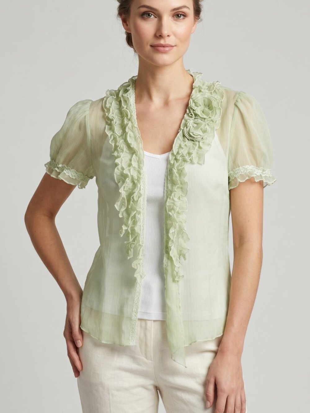 A mint-colored silk bolero